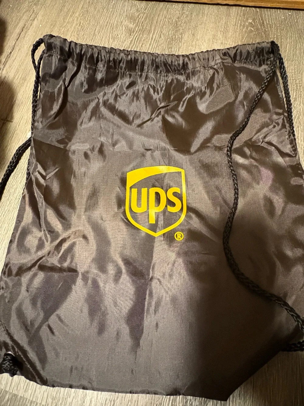 UPS Brown Drawstring Bag with Yellow UPS Logo